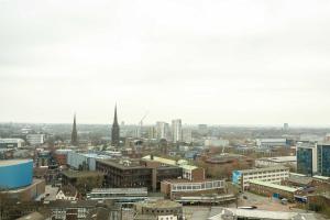 a city view of a city with tall buildings at Studios For 2 Near Coventry Station in Coventry