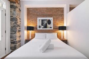 Кровать или кровати в номере Meramont Hotel Downtown