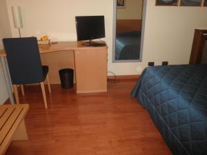 TV a/nebo společenská místnost v ubytování Hotel Selide