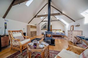 a living room with a wood stove in a room at 1 Bed in Broughton oc-b30218 in Broughton