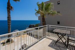 a balcony with a view of the ocean at Villa Acantilado Cabo de Palos in Cabo de Palos
