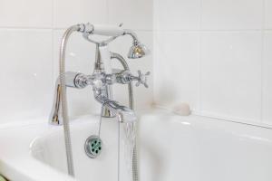 a shower in a bathroom with a tub at 2 Bed in Leintwardine oc-t29563 in Leintwardine +21 photos