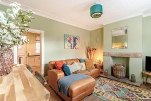 a living room with a couch and a table at 3 Bed in Cromford oc-t30751 in Cromford