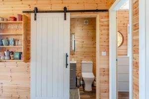 a bathroom with a toilet through a door at 2 Bed in Strathmiglo oc-w32098 in Strathmiglo