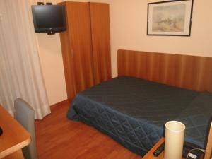 Postel nebo postele na pokoji v ubytování Hotel Selide
