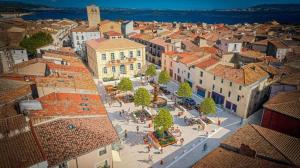 an aerial view of a city with buildings at Le patio Mézois in Mèze