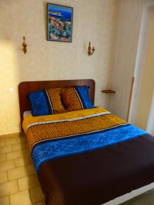 Кровать или кровати в номере Pied A Terre