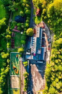 an overhead view of a road with houses and trees at Chata Pieniny in Lesnica