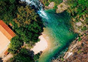 an overhead view of a river and a beach at Casa em Aurora do Tocantins in Manhã