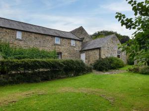 an old stone house with a yard at 3 Bed in Stocksfield oc-32252 in Stocksfield