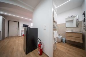 a room with a fire hydrant in a room at Perugia Apartments in Perugia +76 photos