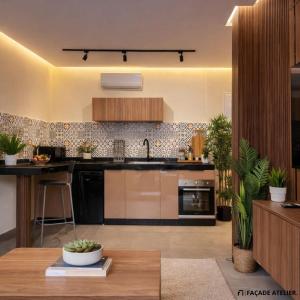 a kitchen with a sink and a counter at Le Calme a Temara in Temara