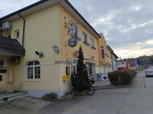 a building with a bike parked in front of it at Double Room Stegersbach in Stegersbach
