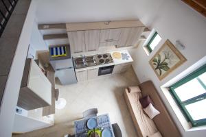 Kuchyň nebo kuchyňský kout v ubytování Apartments Umag Center, seafront with terrace in Umag