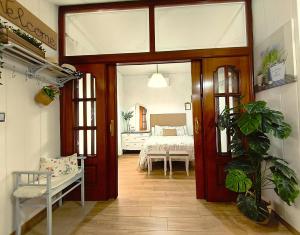 a room with a door leading to a bedroom at Casa tradicional Torrevieja in Torrevieja