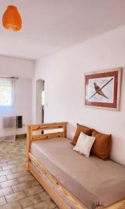 a bedroom with a bed in a room at PISO UNO - Gran Living Comedor y Habitación - PET FRIENDLY - AUTO CHECK IN 24 HS - Para 4 personas - No alquilamos a Bahienses por el momento in Bahía Blanca +20 photos