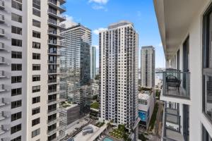 an aerial view of a city with tall buildings at Downtown Luxury Condo withPool & Skyline Views in Miami