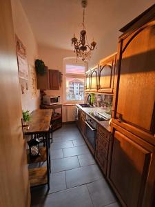 a large kitchen with a table and a dining room at Magische Welt in Bautzen