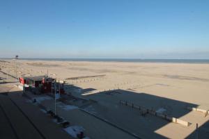 a view of an airport with a large field at Casiola - Beach Studio with Balcony & Sea View in Zeebrugge