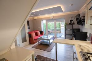 a living room with a couch and a table at Alensgrove Maisonette A in Leixlip