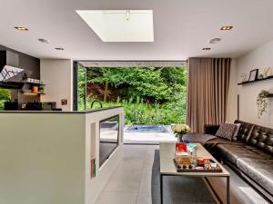 a living room with a couch and a table at 2 Bed in Skipton oc-86230 in Elslack