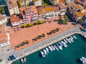 an aerial view of a marina with boats in the water at Casa Marlù - ArgonautiVacanze in Porto Azzurro