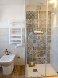 a bathroom with a shower and a sink at La Chiave del Gufo - Bojano in Boiano