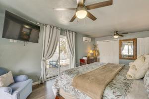 a bedroom with a bed and a ceiling fan at ‘Cliff View Haven’ | Million-Dollar Views at 6MM in Rocky Mount