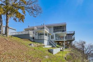 a house on the side of a hill at ‘Cliff View Haven’ | Million-Dollar Views at 6MM in Rocky Mount
