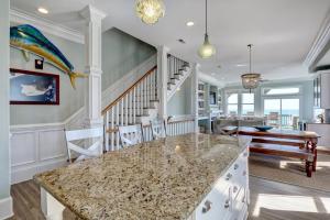 a kitchen with a marble counter top in a room at Tipsy Turtle South-bOceanfront Oasis - Dog Friendly - Pool in Surf City