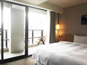 Fotografie z fotogalerie ubytování Inn by the Village v destinaci Tchaj-tung + 38 fotografií