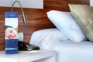 Postel nebo postele na pokoji v ubytování Sunway Playa Golf & Spa Sitges