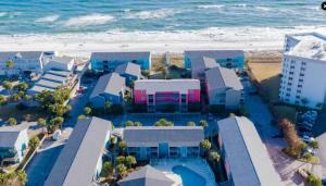 an aerial view of a resort with the beach at Vibrant gulf condo with pool and beach access in Pensacola Beach