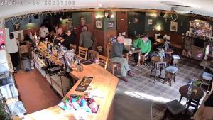 an overhead view of a bar with people sitting at tables at The Inn at Strathyre in Strathyre