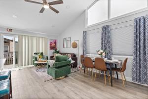 a living room with a couch and a table at Endless Sunset- Near Beach Surf and Pet Friendly in Huntington Beach