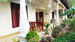 Zahrada ubytování Kassapa Home Stay