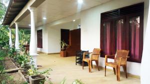 Posezení v ubytování Kassapa Home Stay