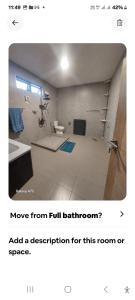 a bathroom with a sink and a toilet in a room at Appartement Le Cap in Cap Malheureux