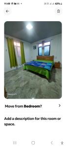 a bedroom with a bed in a room at Appartement Le Cap in Cap Malheureux