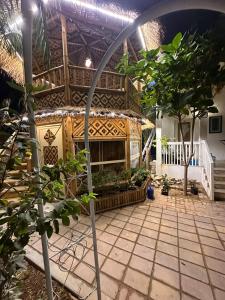 a house with a courtyard with a garden at luule in Al Ain