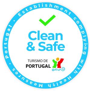 a logo for clean and safe at Casa Castel'Rei in Guimarães