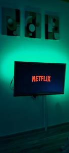 a sign with the words netflix on a wall at Rovinj Romance Apartment in Rovinj