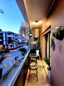 an apartment balcony with a view of a street at CaSa FAMILY HOUSE in Casablanca