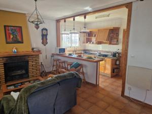 a kitchen with a sink and a counter top at Casa Dulcinea in Alborea
