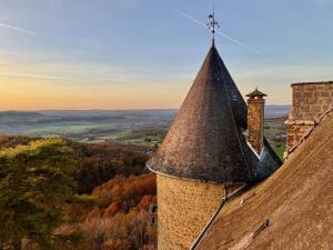 an old building with a tower on top of it at Château Blanat in Saint-Michel-de-Bannières