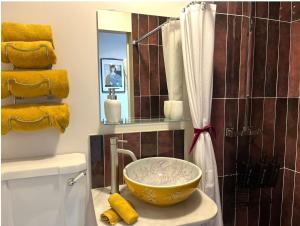 a bathroom with a bowl on top of a sink at Little Gem at Lough Sillan House - Adults only in Shercock