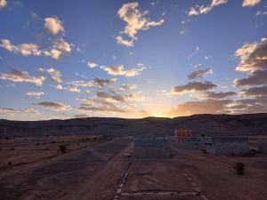 an empty road in the middle of the desert at Dar Bani in Zagora
