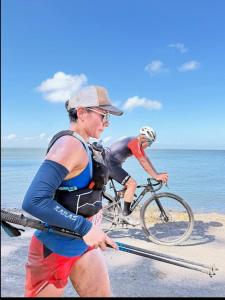 two people on a bike on the beach at Beach cabin ometepe in Altagracia