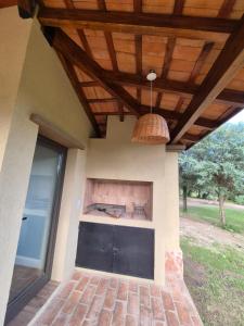 a porch of a house with a wooden ceiling at Casa Nido San Javier in San Javier