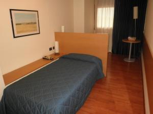 Postel nebo postele na pokoji v ubytování Hotel Selide